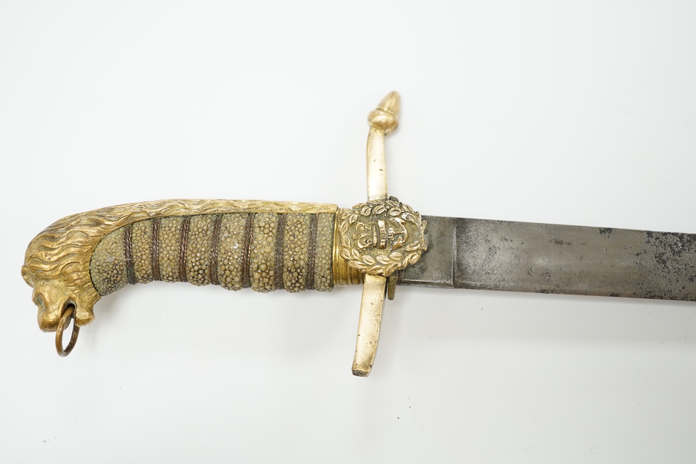 A Victorian naval officer’s dirk, regulation brass hilt (one quillon finial missing), wire bound fish skin grip, blade 39cm. Condition - poor